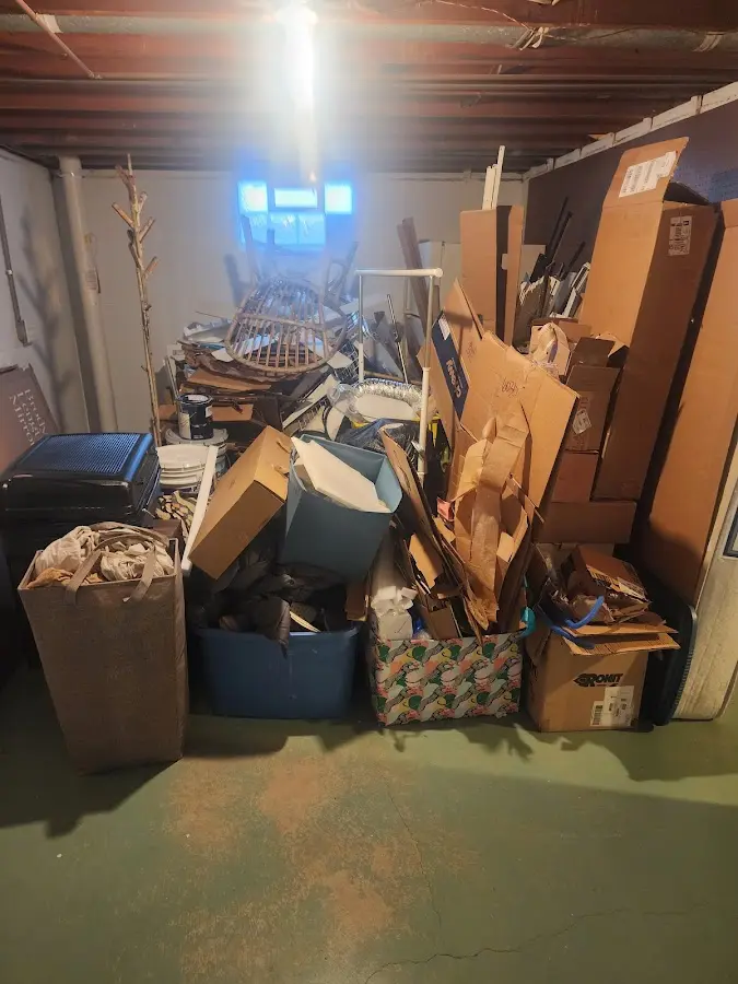 Roll-off dumpster container at job site for Yard Waste Dumpster Rental in Port Huron